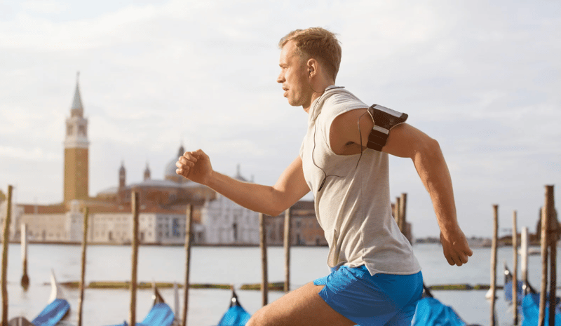 Male runner training near his lactate threshold to enhance endurance.