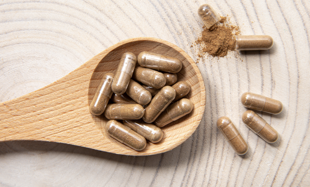 Ashwagandha root capsules, used to support hormonal balance and stress resilience.